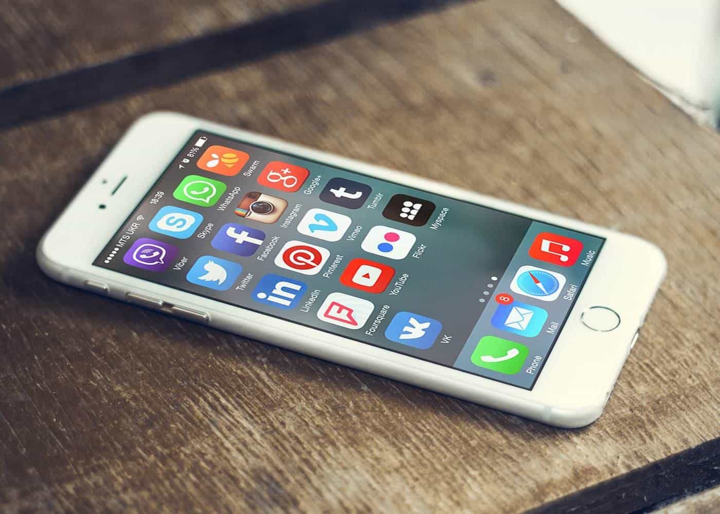 Social media app icons on a smartphone screen