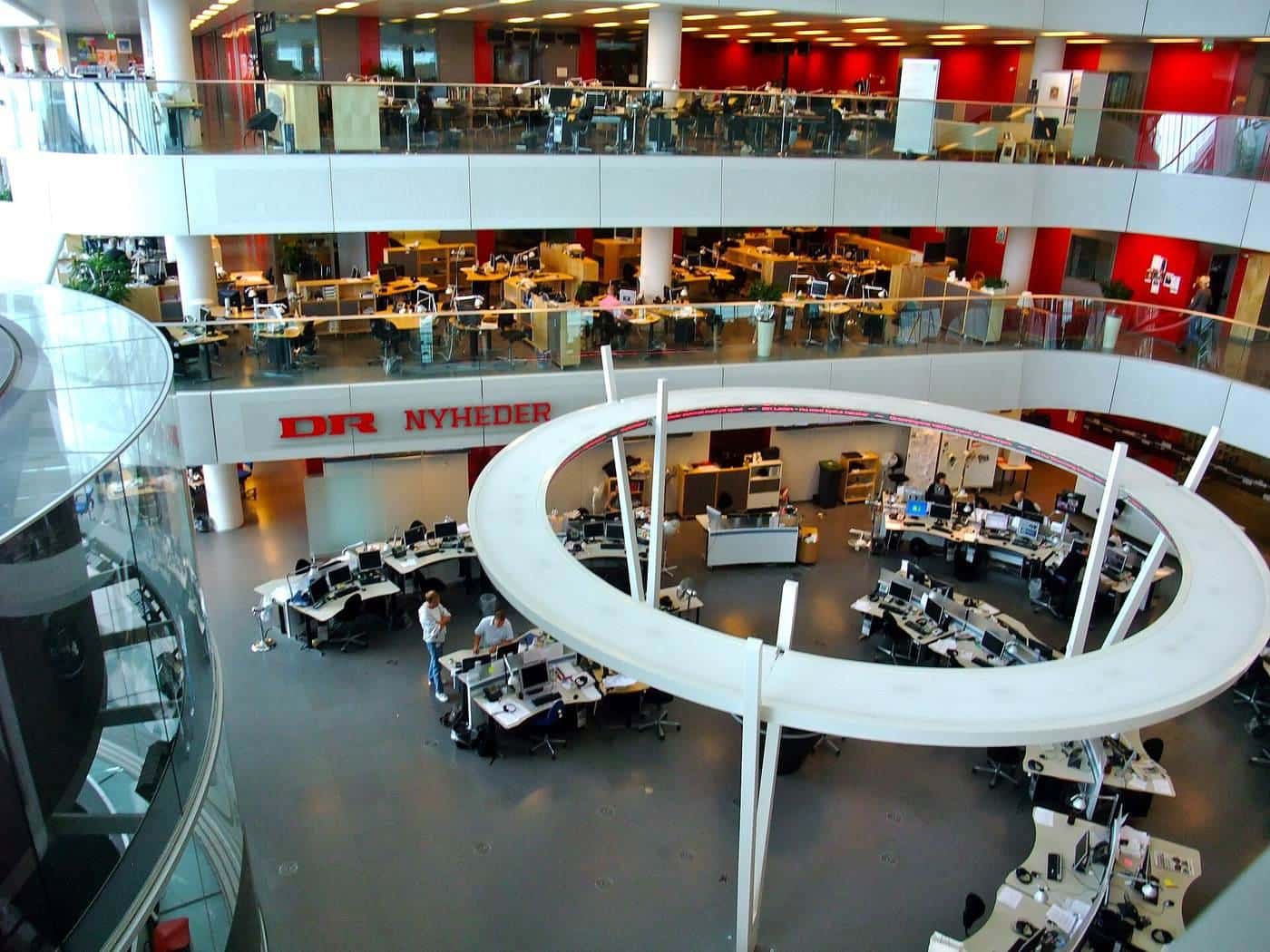 Journalists working in a broadcaster's newsroom