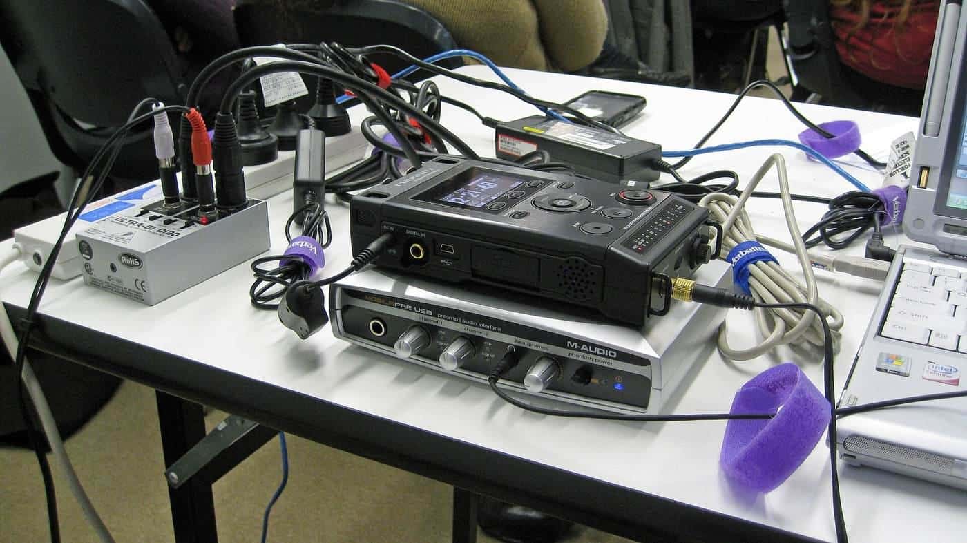 A camera, laptop and microphone set up for recording